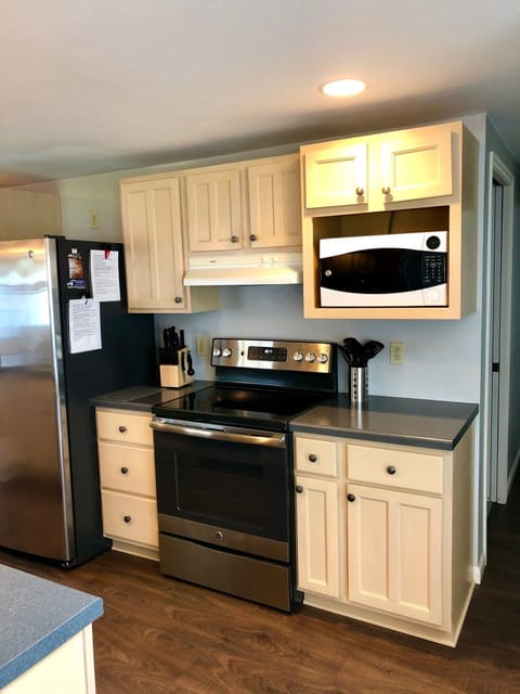 Stainless appliances with smooth top range. 
