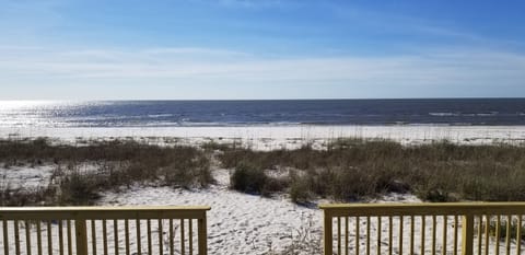 Your very own private beach right outside your door. Softest white sand ever!