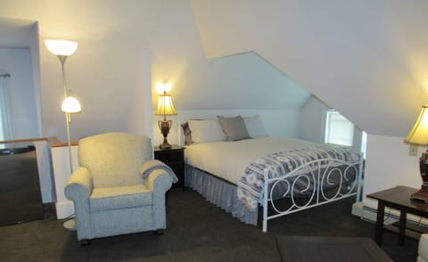 The Queen Size Bed Area in the Master Suite: the Entire Top Floor