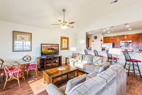 Light-filled living room with comfortable seating for movie nights or laid-back evenings.