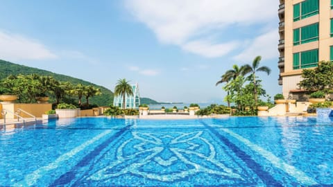 Outdoor pool, pool umbrellas, sun loungers