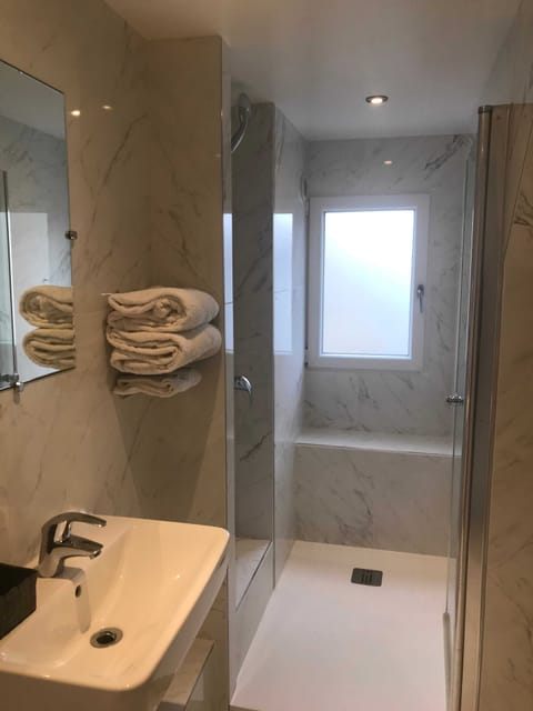 Deluxe Room for 2 (extra fee for extra bed) | Bathroom | Shower, free toiletries, hair dryer, towels