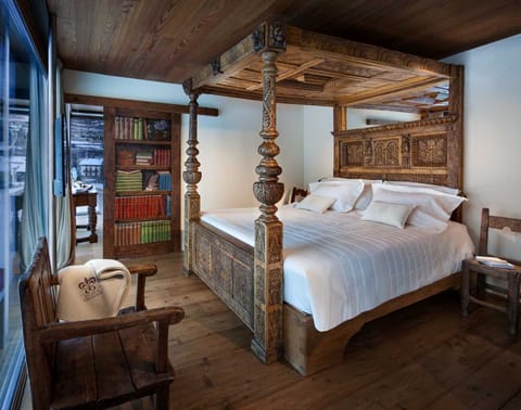 Hypo-allergenic bedding, down comforters, minibar, in-room safe