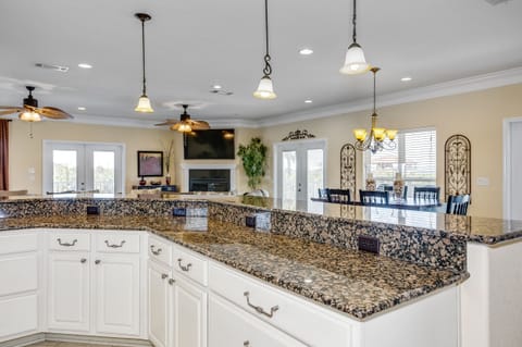 Kitchen with separate bar top and plenty of outlets