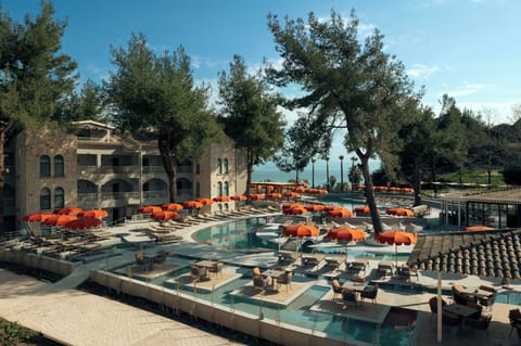 2 outdoor pools, pool umbrellas, sun loungers