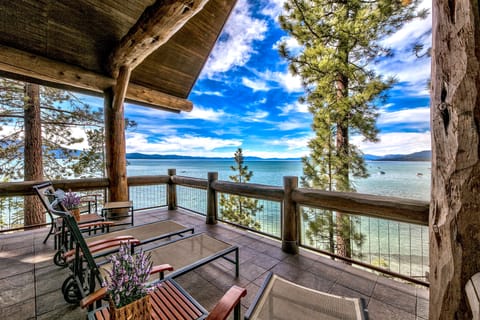 Your private deck overlooks pristine lake waters, where mountain views and gentle breezes create the perfect spot for morning coffee and peaceful evenings.