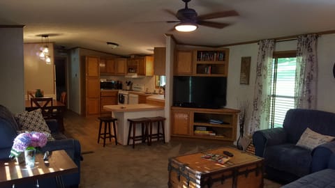 Open concept kitchen, dining, living rooms