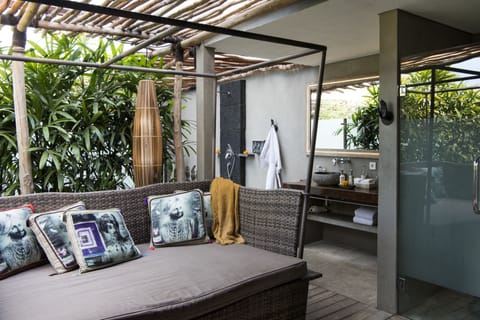 Ginger One Bedroom Suite | Living area | 32-inch LCD TV with cable channels, TV, DVD player