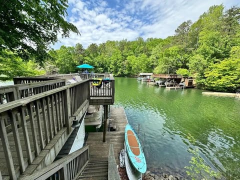 2 Stand-up paddle boards with seats to convert into kayaks. Relaxing deck on top