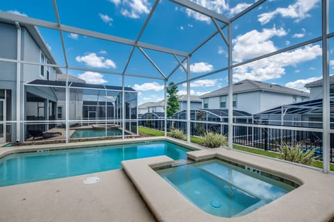 Refreshing Pool Area of the Home in Davenport Florida - Soak up the sun and let the good vibes flow  - Amazing elevated pool area - A serene escape where you can unwind and rejuvenate in style