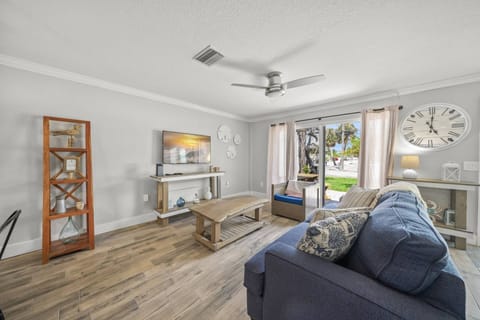 Open up the slider door to get some fresh air! The pool is just steps to your left.