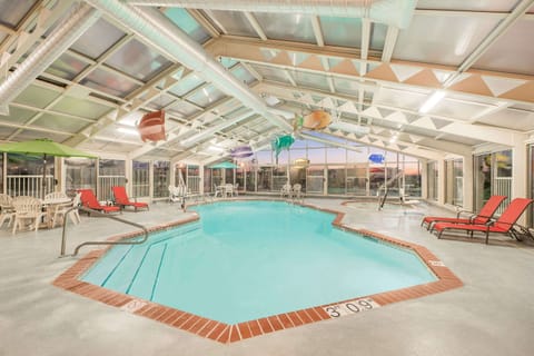 Indoor pool, open 7:00 AM to 10:00 PM, sun loungers