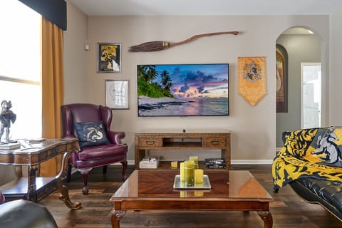 Welcome to Hogwarts! Our Hufflepuff Commons is the perfect place to hangout. It features a 75" smart TV and a custom made Nimbus 2000.