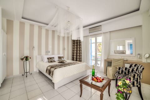 Junior Suite, Sea View | In-room safe, blackout drapes, soundproofing, iron/ironing board