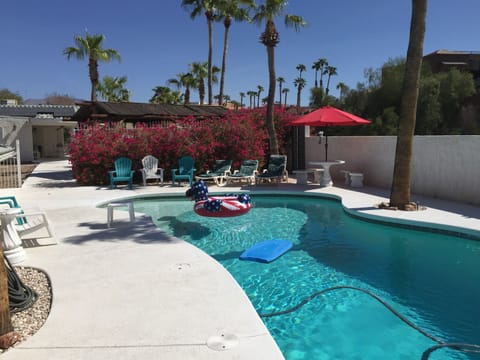 35000 gallon solar heated pool with diving board 12 ft deep end 2 hammocks 