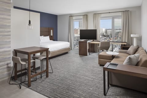 Down comforters, desk, laptop workspace, blackout drapes