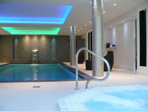 Indoor pool, open 8 AM to 7:00 PM, pool umbrellas, sun loungers