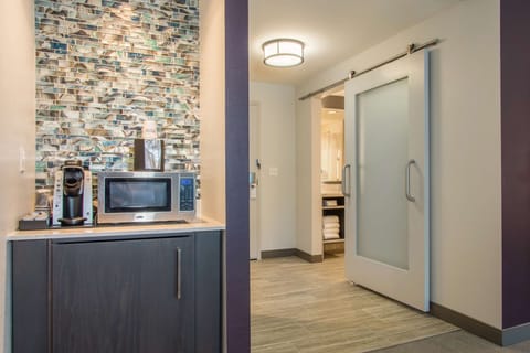 Designer toiletries, hair dryer, towels, soap