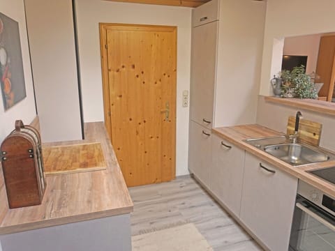 Cabinetry, Property, Countertop, Sink, Kitchen Sink, Building, Interior Design, Wood, Tap, Floor