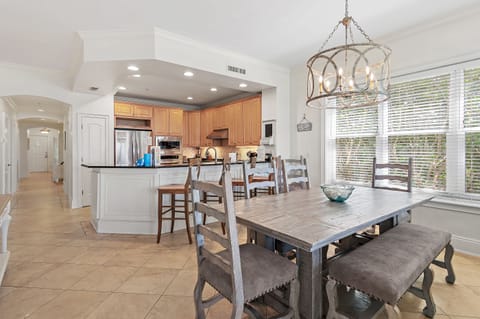 Dining Area - The kitchen flows effortlessly into the dining area, making it easy to enjoy meals and gather with family and friends.