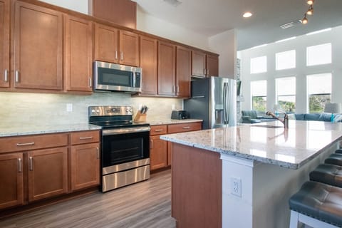 Open kitchen with plenty of empty cabinets to put your groceries