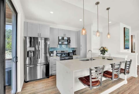 The stylish kitchen is perfect for preparing delicious meals to enjoy with your family.