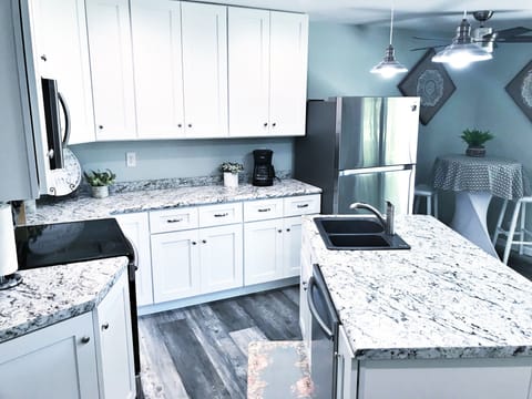 Open kitchen with full size appliances