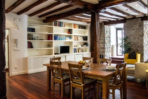 Living room and Dining area with access to patio
