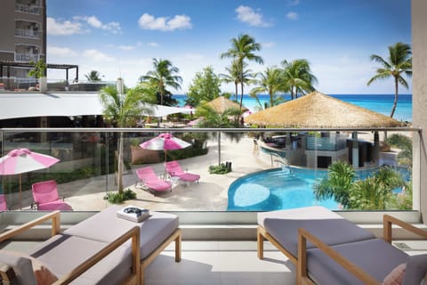 Junior Suite, Pool View (Luxury) | Free minibar, in-room safe, desk, laptop workspace