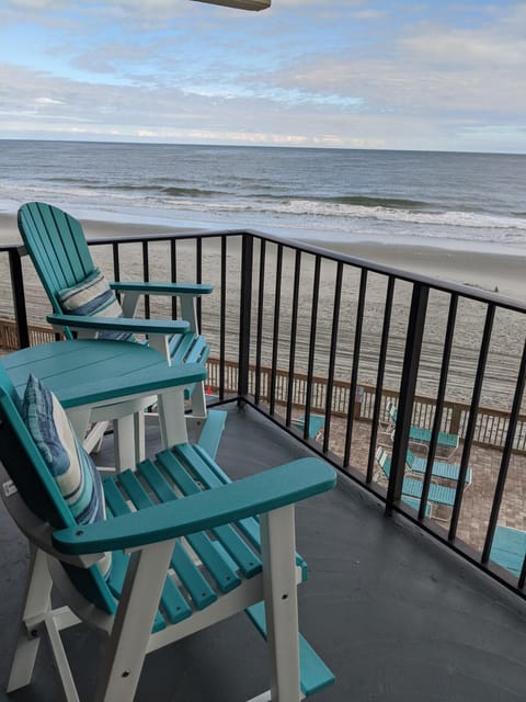 New beach chairs view above the railing for an outstanding view