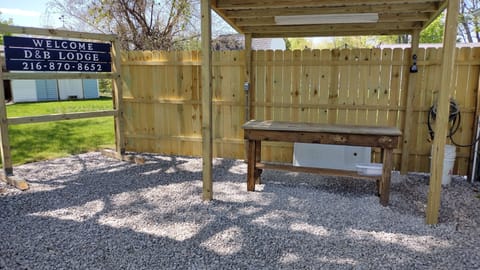 fish cleaning station with water and electric and fish hanging rack 