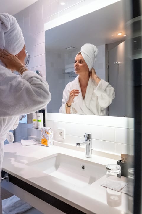 Eco-friendly toiletries, hair dryer, bathrobes, slippers