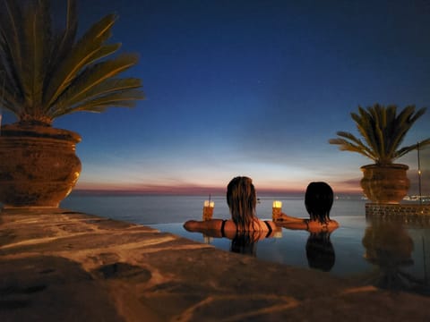 Stunning sunset ocean views right from the rooftop infinity jacuzzi.