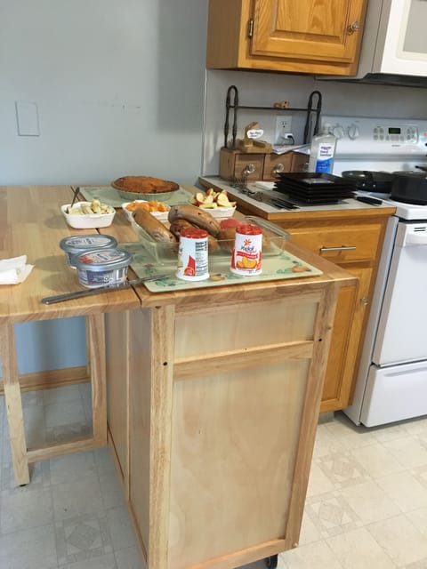 Kitchen .  Counter area converts into additional buffet or eating area.