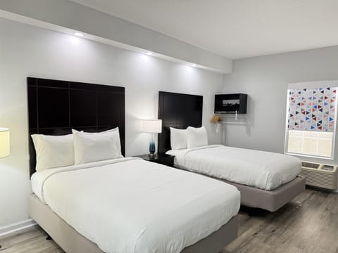 Pillowtop beds, desk, laptop workspace, iron/ironing board