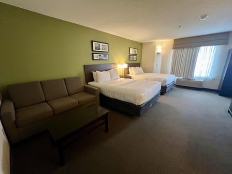 Suite, 2 Queen Beds, Non Smoking (Walk-in Shower;with Sofabed) | Individually decorated, individually furnished, desk, laptop workspace