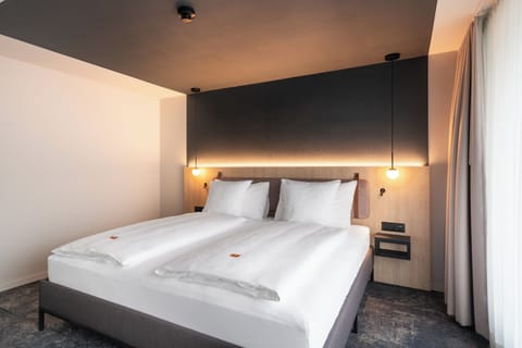 Spacious Roof Top Room | Minibar, in-room safe, individually decorated, individually furnished