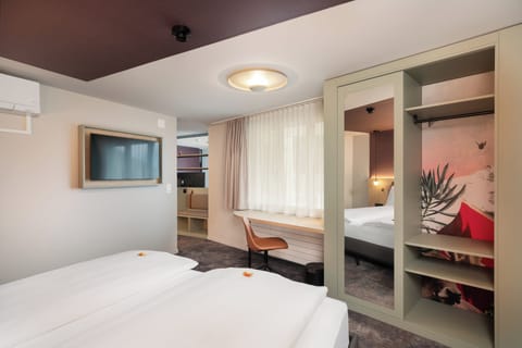 Spacious Roof Top Room | Minibar, in-room safe, individually decorated, individually furnished