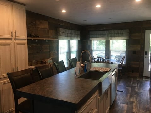 Kitchen island with comfortable bar seats.
