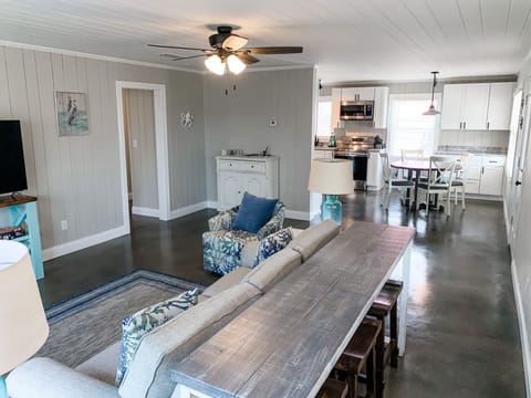 Extra high top seating behind couch