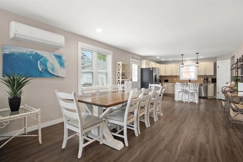 Dining area with barn wood table and chairs for 10