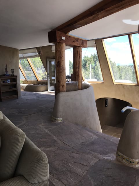 Grand Staircase Leading Down To 2 Bedroom Suites.