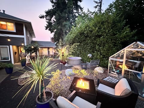 Right outside your front door are both the spa patio and the garden patio