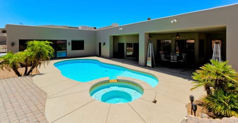 Large patio with beautiful pool and spa