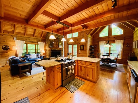 Fully open main level with kitchen, dining, gathering room