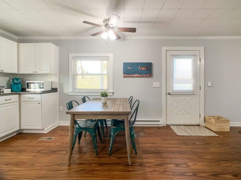 Sturdy dining table and chairs for four.