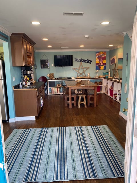 Game room leading out to large back deck and private back yard 