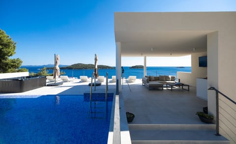 Villa (Three Bedroom Villa with Pool) | Pool | Seasonal outdoor pool, a rooftop pool, pool umbrellas, sun loungers