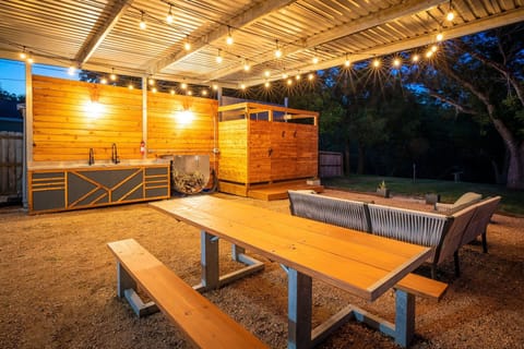 Covered outdoor lounge + dining space