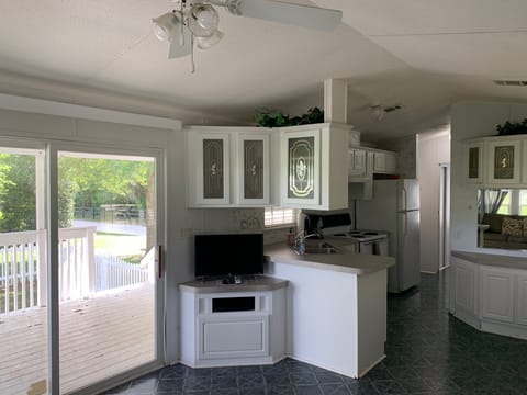 Pecan Cottage | Private kitchen | Full-size fridge, microwave, coffee/tea maker, cookware/dishes/utensils